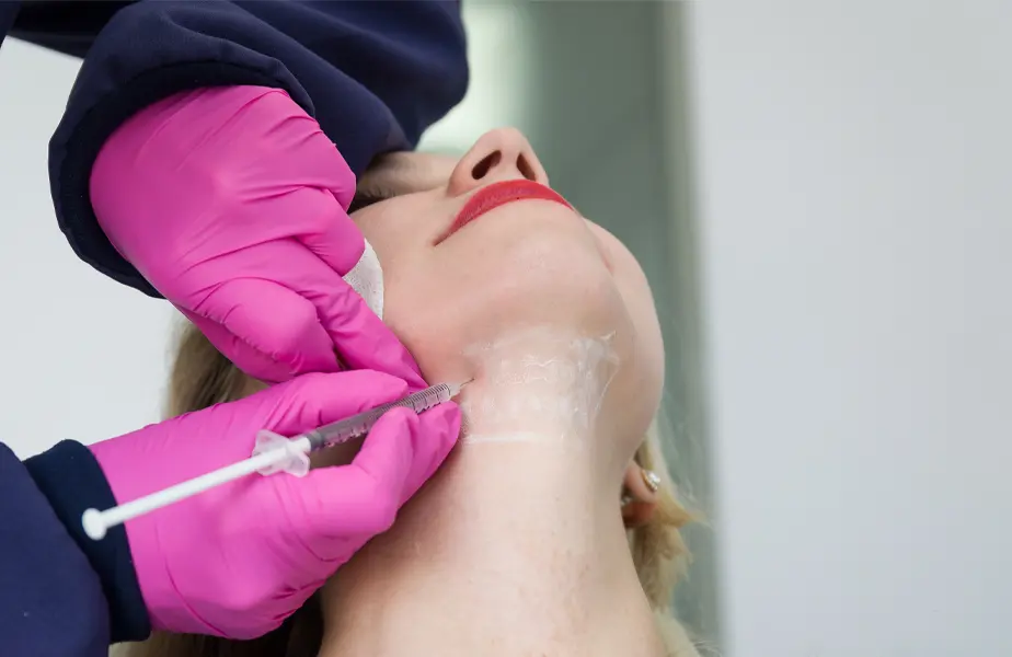 Beautiful Woman Receiving Double Chin Removal Kybella Injection | The Cosmetic Clinic in Greenwich, CT