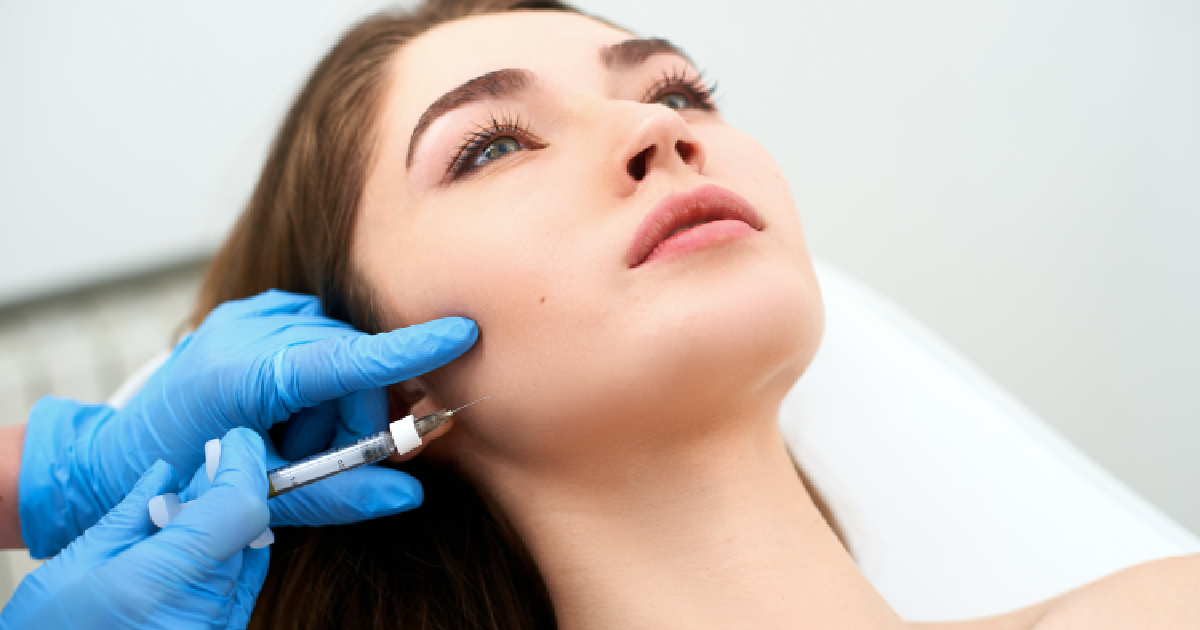 Woman receiving Kybella injection in Greenwich, CT from a Professional