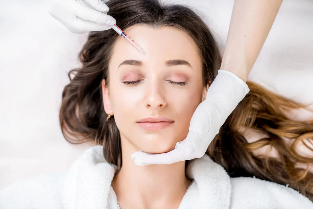 Women getting an injection above the eye
